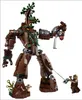 A Lego tree-like creature and a small Lego figure. Produktbild-Vorschau