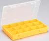 A yellow plastic storage box with a clear lid is shown open against a light gray background. Produktbild-Vorschau
