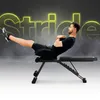 A man is performing an abdominal exercise on a weight bench. The background has a smoky effect and neon text. Podgląd zdjęcia produktu