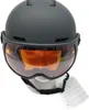 A black ski helmet with an orange visor is shown from the front. Voir les images du produit
