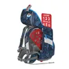 A side view of a blue backpack with a camouflage pattern, showing its various compartments and accessories. Náhľad obrázku produktu