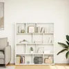 A white bookshelf filled with books and decorative items in a room. Náhled obrázku produktu