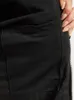 A close-up view of the inside of a black jacket pocket, with a hand reaching into it. Produktbild-Vorschau