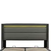 Close-up of a grey upholstered bed frame with integrated LED lighting. Produktbild-Vorschau