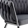Close-up view of a gray upholstered chair with chrome accents. Anteprima dell’immagine prodotto