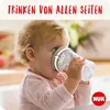 A baby drinking from a cup with a 360-degree drinking rim. Podgląd zdjęcia produktu