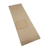 A brown paper vacuum cleaner bag with a clear window is shown against a white background. Produktbild-Vorschau
