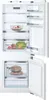 An open refrigerator with shelves and drawers visible. Produktbild-Vorschau