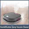 A robotic vacuum cleaner is shown on a wooden floor, spraying mist. Produktbild-Vorschau