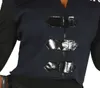 Close-up of a person wearing a dark blue jacket with black sleeves and shiny black decorative elements. Podgląd zdjęcia produktu