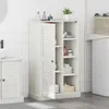 A white bathroom cabinet with louvered doors and open shelves, displaying various bathroom items. Anteprima dell’immagine prodotto