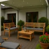 An outdoor patio scene with wooden furniture and plants. Produktbild-Vorschau