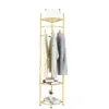 A gold metal corner garment rack with shelves, holding clothes and books. Podgląd zdjęcia produktu