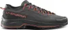A side view of a black and gray hiking shoe with orange accents. Produktbild-Vorschau