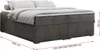 A low-profile box spring bed frame with storage drawers, shown from a side-front angle with bedding. Produktbild-Vorschau