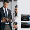 A man and a woman in business attire looking at a tablet device. Náhled obrázku produktu