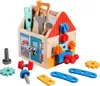 A wooden toy toolbox with various tools and building components scattered around it. Produktbild-Vorschau