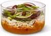 A glass bowl filled with rice, vegetables, and almonds. Anteprima dell’immagine prodotto