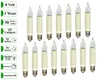 A collection of small, candle-shaped light bulbs with cream-colored bases and clear glass tops, arranged in two rows. Produktbild-Vorschau