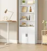A white bookcase with books and decorative items on shelves, next to a desk with a lamp and clock. Náhled obrázku produktu