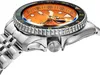 A close-up, side view of a Seiko 5 Sports GMT watch with an orange dial and a stainless steel bracelet. Podgląd zdjęcia produktu