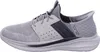 A side view of a gray athletic shoe. Voir les images du produit