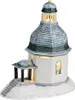A ceramic Christmas village building, a chapel with a steeple, covered in snow. Produktbild-Vorschau