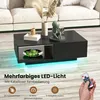 A modern living room scene featuring a black coffee table with integrated LED lighting. Anteprima dell’immagine prodotto