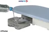 Water being poured from a bottle into a water tank of an ironing board. Produktbild-Vorschau