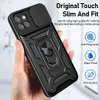 A hand holding a black phone case with a ring stand and camera cover. Produktbild-Vorschau