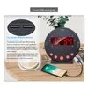 A bedside alarm clock with dual USB charging ports and a smartphone charging. Náhľad obrázku produktu