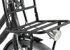 Close-up of the front rack and headlight of a black e-bike. Voir les images du produit
