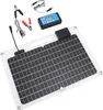 A solar panel kit with a charge controller and accessories laid out on a white background. Podgląd zdjęcia produktu