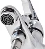 A close-up view of a chrome faucet, focusing on the shower head and connection. Produktbild-Vorschau