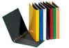 A collection of colorful ring binders standing upright, with one open binder in the foreground. Anteprima dell’immagine prodotto