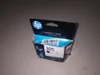 A black HP 305 ink cartridge in its packaging, placed on a gray surface. Produktbild-Vorschau