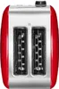 A top-down view of a red and silver toaster. Produktbild-Vorschau