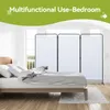 A bedroom scene with a bed and a room divider. Podgląd zdjęcia produktu