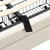 A close-up view of a bed frame's support structure, showing wooden slats and a black strap. Anteprima dell’immagine prodotto