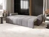 A modern living room with a grey sofa bed. Voir les images du produit