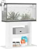 A white aquarium stand with an aquarium on top, containing fish and plants. The stand has two shelves, one with a gray storage box and the other with two jars and two bags of pet food. Náhled obrázku produktu