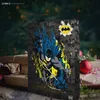 A Batman advent calendar is displayed in a festive setting with wrapped gifts and Christmas ornaments. Anteprima dell’immagine prodotto