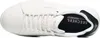 A top-down view of a white Skechers sneaker. Anteprima dell’immagine prodotto