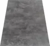 A gray rug is shown from a slightly elevated angle against a white background. Voir les images du produit