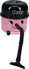 A pink and black Hetty desk vacuum cleaner with its hose and nozzle attached. Produktbild-Vorschau