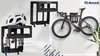 A bicycle and cycling accessories are displayed on wall mounts. Náhled obrázku produktu