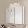 A modern bathroom vanity with a mirrored cabinet and integrated lighting. Voir les images du produit