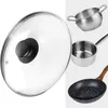 A collage of kitchenware, including a glass lid, a small pot, a saucepan, and a frying pan. Produktbild-Vorschau