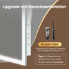 A close-up marketing image showing a bathroom mirror with integrated lighting and a power outlet, alongside an electric shaver and toothbrush. Produktbild-Vorschau
