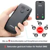 A hand holding a black senior-friendly mobile phone, with a smartphone screen showing a call to 'Oma' and a diagram illustrating SOS contacts. Produktbild-Vorschau